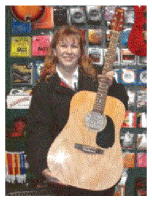 Free Acoustic Guitar Winner - Mrs. K.!